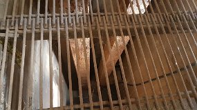 20210918_104914 Wheat emptied from bags and raised to conveyor belt along roof peak